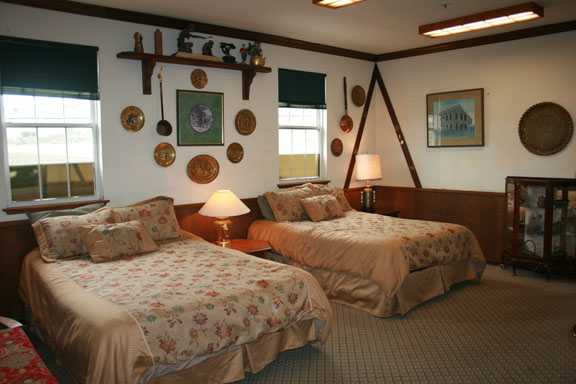 Room 2 The Cottage Room Features a Queen bed and sitting area. Cozy and intimate. Shared bath. Views of the Coastal Mountains & the historic Johnston House, built circa 1853.